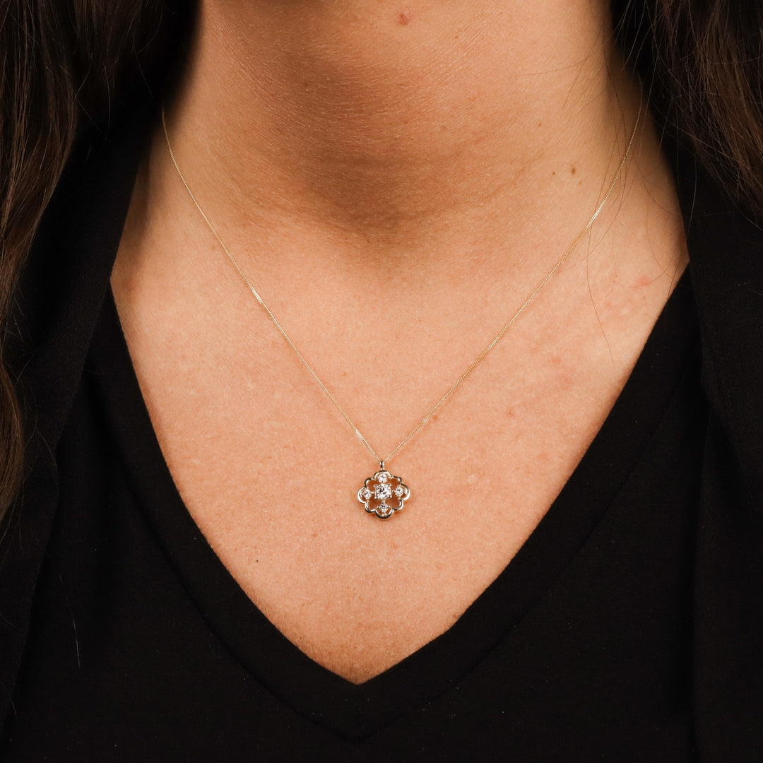 10k yellow gold floral pendant