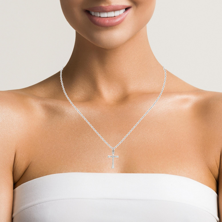 Silver Cross Pendant with CZ Center.
